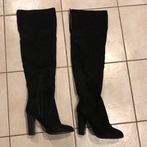Black tall over the knee boots